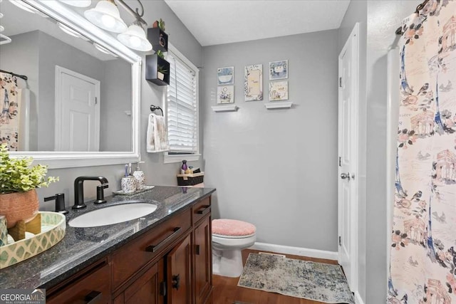 916 Marshall Fuller Rd, Dallas, GA 30157 - bathroom featuring vanity, wood finished floors, and curtained shower