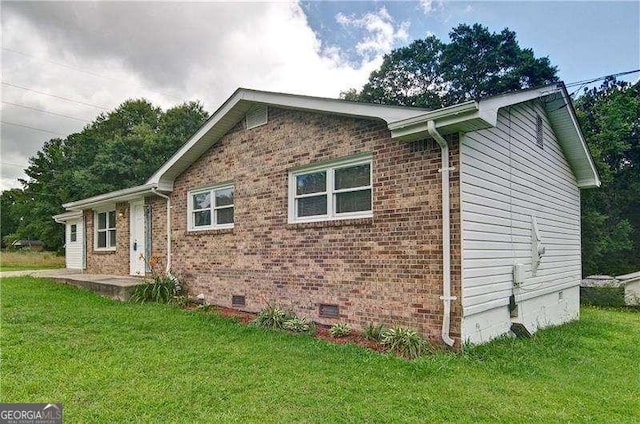 24 Echo Ridge Dr, Powder Springs, GA 30127 - view of home's exterior featuring crawl space, a yard, and brick siding