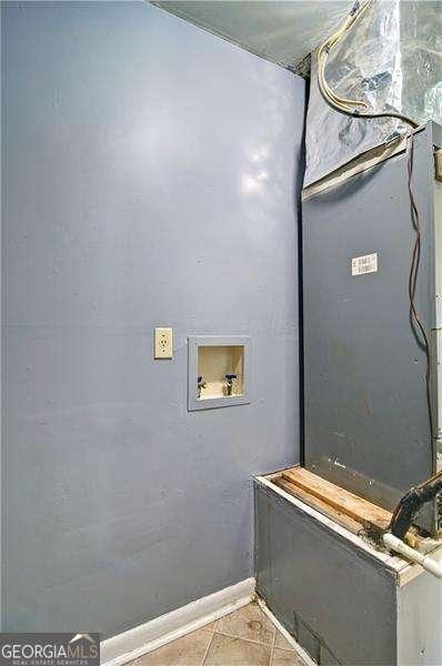 24 Echo Ridge Dr, Powder Springs, GA 30127 - washroom with washer hookup and tile patterned flooring