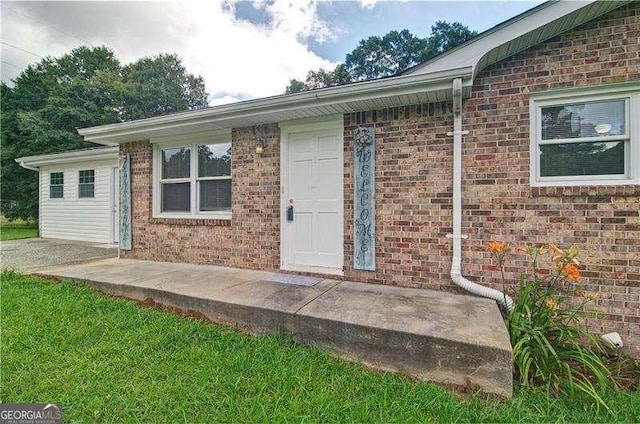 24 Echo Ridge Dr, Powder Springs, GA 30127 - view of exterior entry featuring brick siding