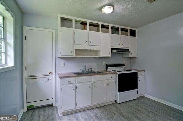 24 Echo Ridge Dr, Powder Springs, GA 30127 - kitchen with white appliances, ventilation hood, light wood-style flooring, white cabinetry, and a textured ceiling