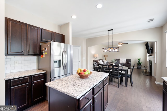 207 Cross Rd, Acworth, GA 30102 - kitchen with stainless steel refrigerator with ice dispenser, a ceiling fan, dark brown cabinets, dark wood finished floors, and tasteful backsplash