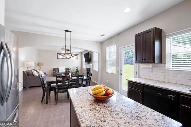 207 Cross Rd, Acworth, GA 30102 - kitchen featuring freestanding refrigerator, black dishwasher, plenty of natural light, wood finished floors, and recessed lighting