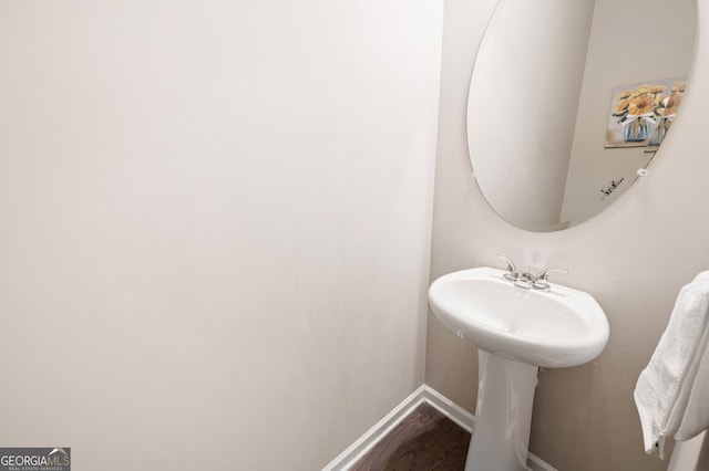 207 Cross Rd, Acworth, GA 30102 - bathroom featuring baseboards and wood finished floors