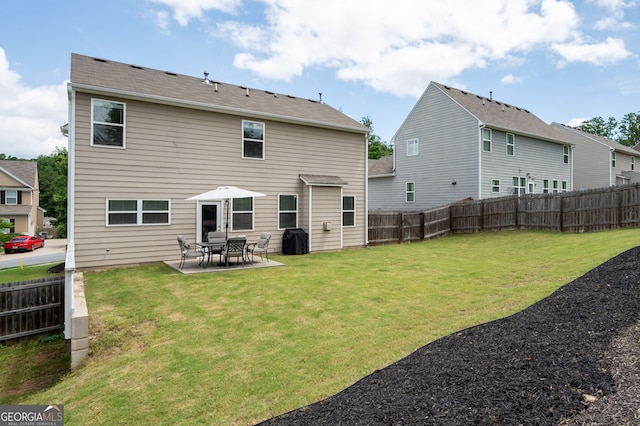207 Cross Rd, Acworth, GA 30102 - back of house with a fenced backyard and a patio