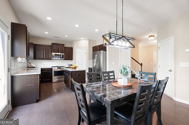 207 Cross Rd, Acworth, GA 30102 - dining area with dark wood-style floors, stairway, and recessed lighting