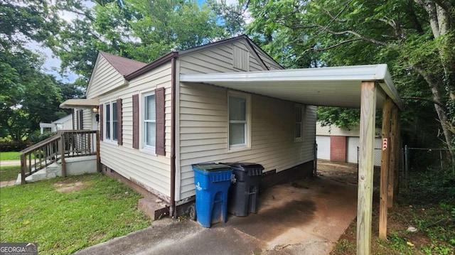 2430 Semmes St, Atlanta, GA 30344 - view of side of property with an attached carport and crawl space