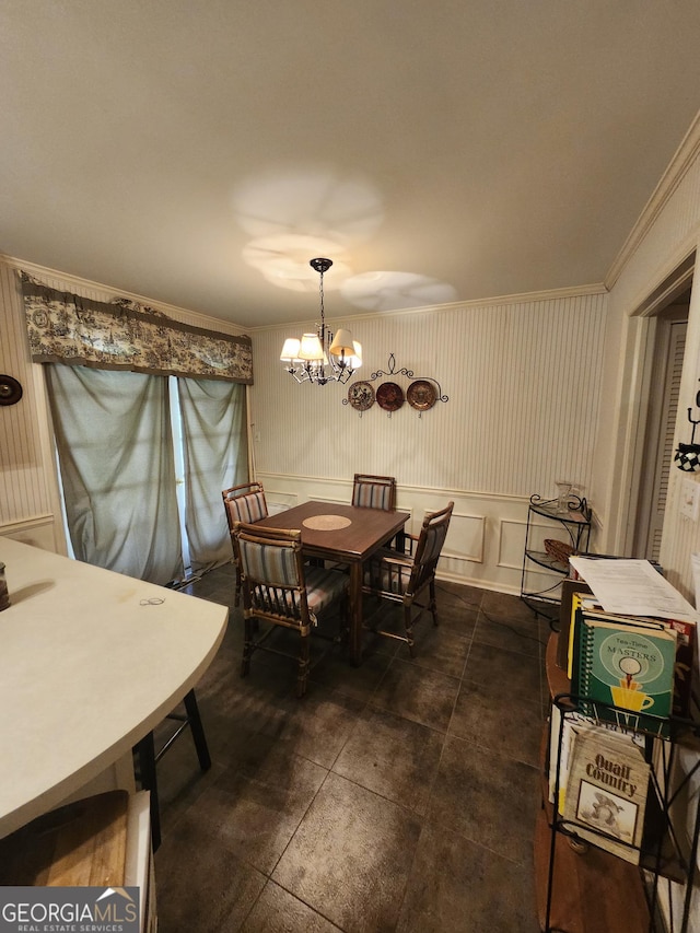 5001 Old Dawson Rd, Albany, GA 31721 - dining room featuring a chandelier, ornamental molding, and a decorative wall