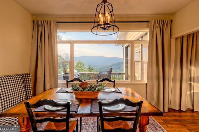 63 Maple Ridge Trl, Clayton, GA 30525 - dining space featuring a chandelier, wood finished floors, and a mountain view