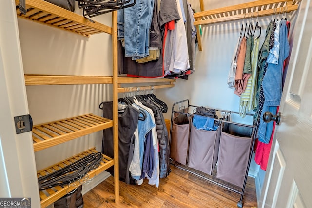 63 Maple Ridge Trl, Clayton, GA 30525 - spacious closet featuring wood finished floors