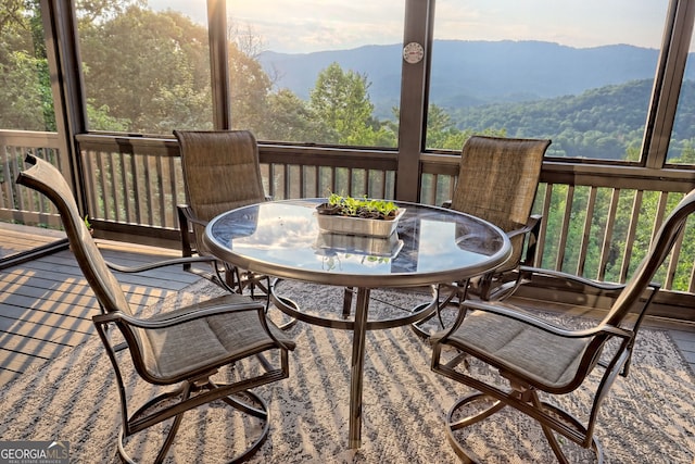 63 Maple Ridge Trl, Clayton, GA 30525 - sunroom / solarium with outdoor dining area, healthy amount of natural light, and a mountain view