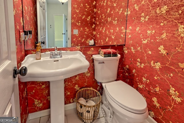 63 Maple Ridge Trl, Clayton, GA 30525 - half bath featuring wallpapered walls and tile patterned flooring