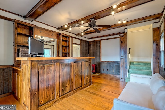 63 Maple Ridge Trl, Clayton, GA 30525 - bar with light wood-style floors, beam ceiling, a ceiling fan, stairs, and wooden walls