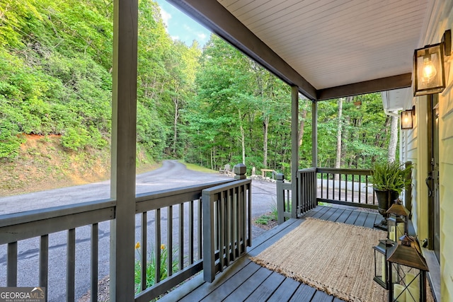 63 Maple Ridge Trl, Clayton, GA 30525 - wooden terrace with a view of trees