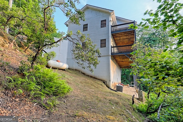 63 Maple Ridge Trl, Clayton, GA 30525 - rear view of house featuring a balcony