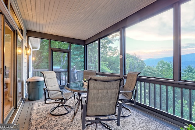 63 Maple Ridge Trl, Clayton, GA 30525 - sunroom / solarium featuring plenty of natural light and outdoor dining area