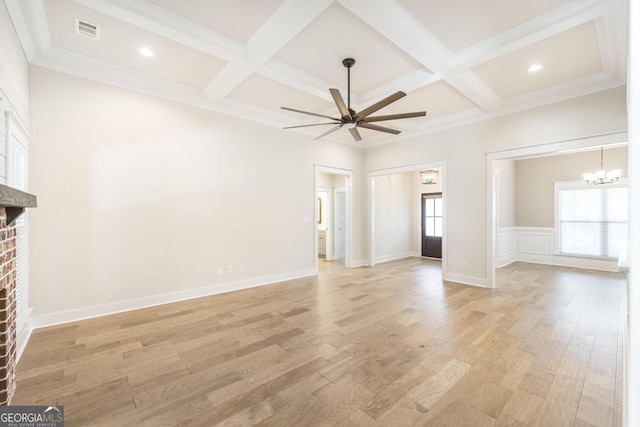 115 Gracetree Way, Kathleen, GA 31047 - unfurnished living room with a ceiling fan, a fireplace, coffered ceiling, beam ceiling, and a chandelier