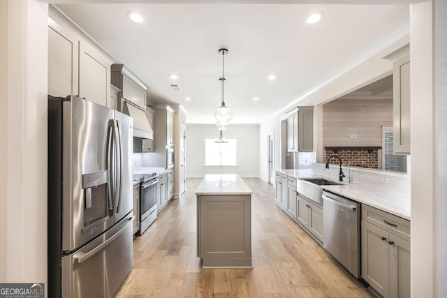 115 Gracetree Way, Kathleen, GA 31047 - kitchen featuring stainless steel appliances, gray cabinetry, a kitchen island, backsplash, and recessed lighting