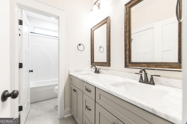 115 Gracetree Way, Kathleen, GA 31047 - bathroom featuring double vanity and tile patterned flooring