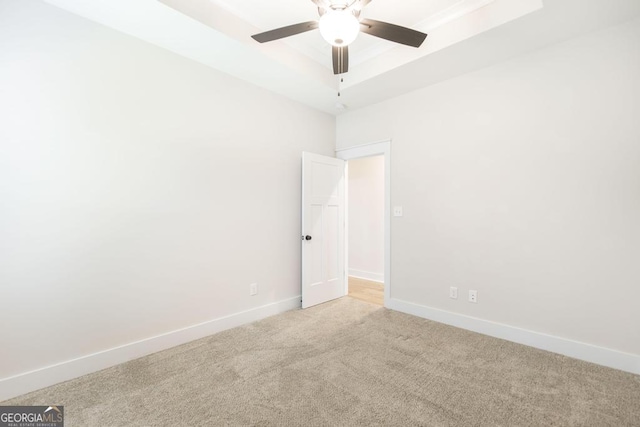 115 Gracetree Way, Kathleen, GA 31047 - spare room with a raised ceiling, light carpet, and a ceiling fan