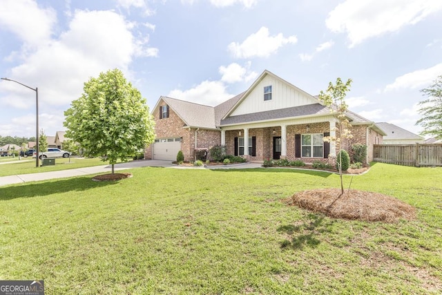 115 Gracetree Way, Kathleen, GA 31047 - view of front of property with a garage, brick siding, driveway, and board and batten siding