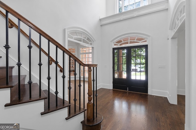 1650 Harvest Ln, Alpharetta, GA 30004 - entryway with a high ceiling, wood finished floors, and stairway