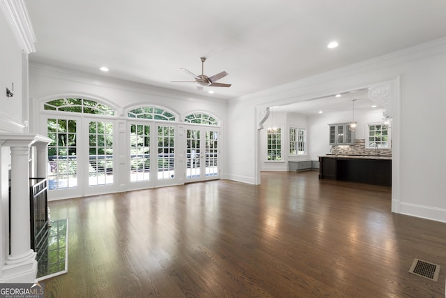 1650 Harvest Ln, Alpharetta, GA 30004 - unfurnished living room featuring ceiling fan, plenty of natural light, crown molding, a fireplace, and recessed lighting