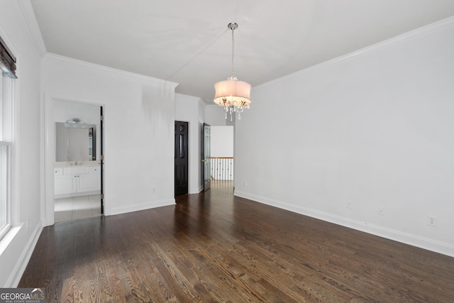 1650 Harvest Ln, Alpharetta, GA 30004 - unfurnished room with a chandelier, crown molding, and dark wood-style floors