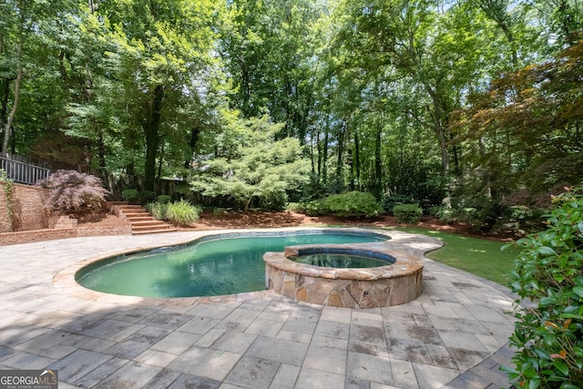 1650 Harvest Ln, Alpharetta, GA 30004 - view of pool featuring stairway, a pool with connected hot tub, and a patio