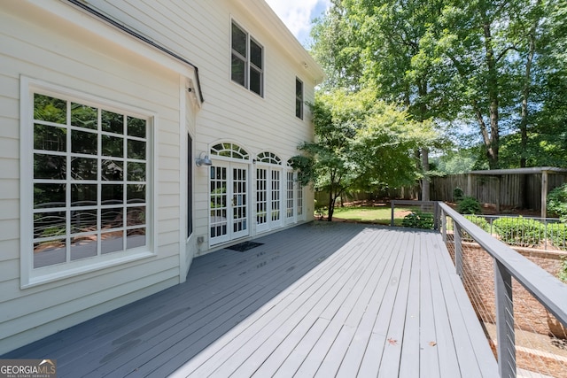 1650 Harvest Ln, Alpharetta, GA 30004 - wooden deck with a fenced backyard and french doors
