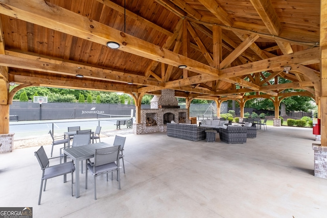 1650 Harvest Ln, Alpharetta, GA 30004 - view of patio / terrace featuring a gazebo, an outdoor living space with a fireplace, and outdoor dining area