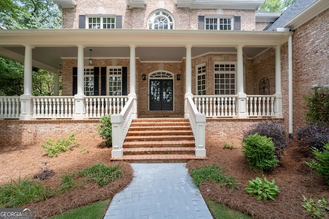 1650 Harvest Ln, Alpharetta, GA 30004 - property entrance featuring brick siding and a porch
