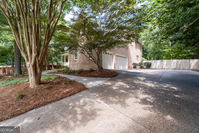 1650 Harvest Ln, Alpharetta, GA 30004 - view of front of property with concrete driveway and a garage