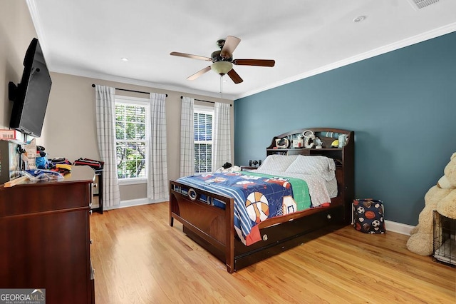 1875 Edgemont Ct, Cumming, GA 30041 - bedroom featuring wood finished floors, crown molding, and a ceiling fan