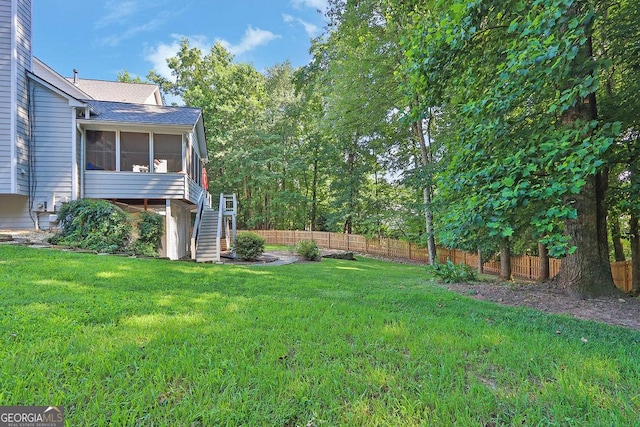 1875 Edgemont Ct, Cumming, GA 30041 - view of yard featuring a sunroom and stairway