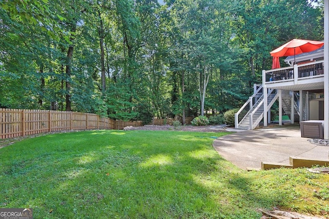 1875 Edgemont Ct, Cumming, GA 30041 - view of yard with stairway, a patio area, and a wooden deck