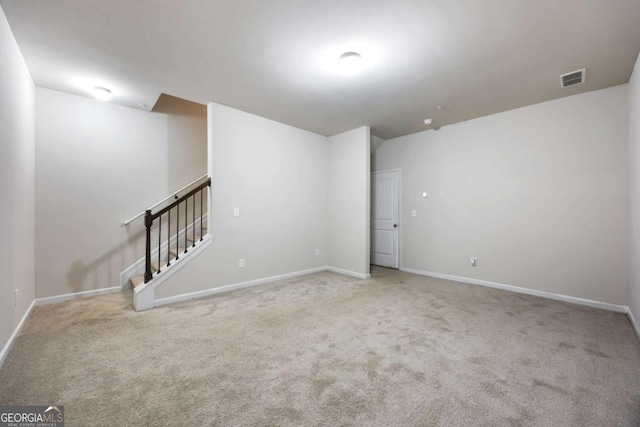 1005 Bayrose Cir Unit 5A, Atlanta, GA 30344 - spare room with carpet flooring and stairway