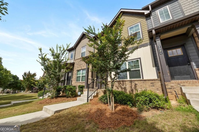 1005 Bayrose Cir Unit 5A, Atlanta, GA 30344 - townhome / multi-family property with brick siding and a front lawn