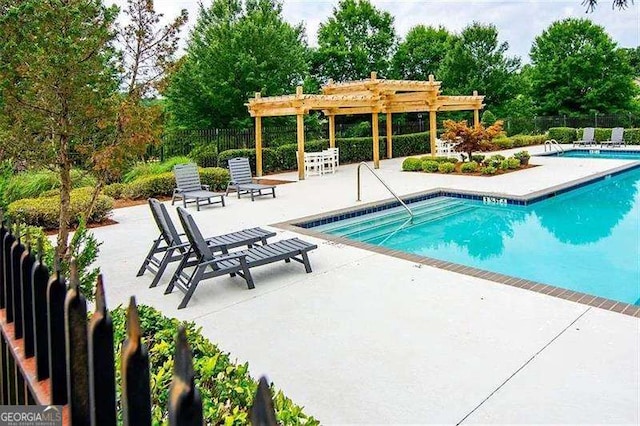 1005 Bayrose Cir Unit 5A, Atlanta, GA 30344 - community pool featuring a pergola, a patio, and view of wooded area