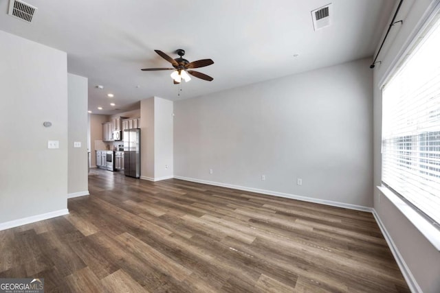 1005 Bayrose Cir Unit 5A, Atlanta, GA 30344 - unfurnished living room with ceiling fan, healthy amount of natural light, dark wood-style floors, and recessed lighting