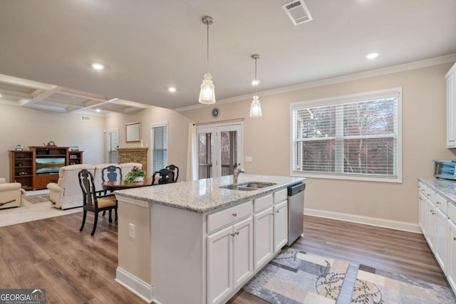 4636 SW Silver Oak Dr SW, Gainesville, GA 30504 - kitchen featuring dishwasher, wood finished floors, white cabinets, recessed lighting, and ornamental molding