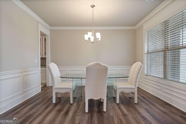 4636 SW Silver Oak Dr SW, Gainesville, GA 30504 - dining room with a chandelier, crown molding, dark wood finished floors, wainscoting, and a decorative wall