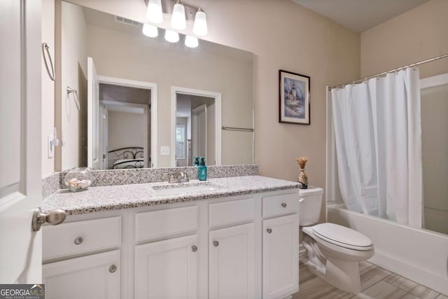 4636 SW Silver Oak Dr SW, Gainesville, GA 30504 - full bath with vanity, shower / tub combo with curtain, and wood finished floors