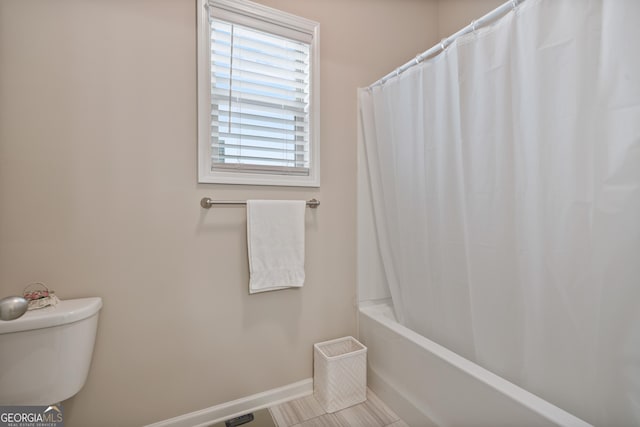 4636 SW Silver Oak Dr SW, Gainesville, GA 30504 - full bathroom with shower / bath combo and tile patterned flooring