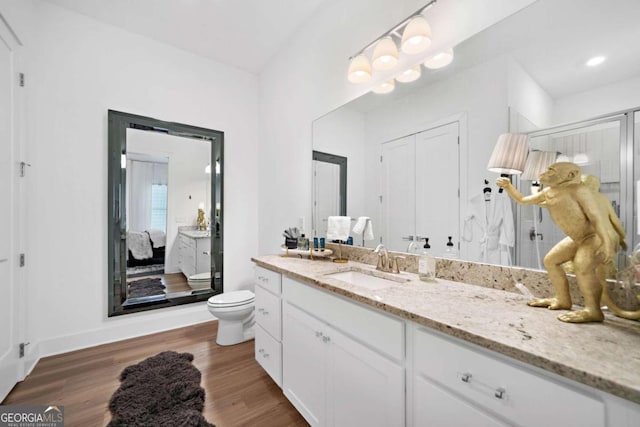 103 Marina Parc Dr, Waleska, GA 30183 - bathroom featuring vanity, wood finished floors, a stall shower, and ensuite bath