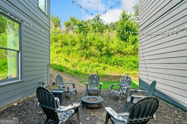 103 Marina Parc Dr, Waleska, GA 30183 - view of patio / terrace with a fire pit