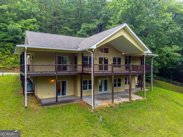 55 Cool Spring Ln, Clayton, GA 30525 - rear view of house with a patio, a lawn, french doors, a shingled roof, and a wooden deck