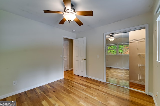 55 Cool Spring Ln, Clayton, GA 30525 - unfurnished bedroom featuring a closet, light wood-style floors, and ceiling fan