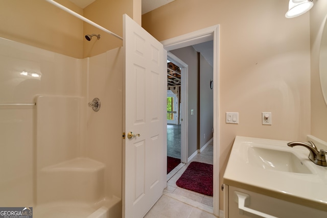 55 Cool Spring Ln, Clayton, GA 30525 - bathroom featuring tile patterned flooring, a shower, and vanity