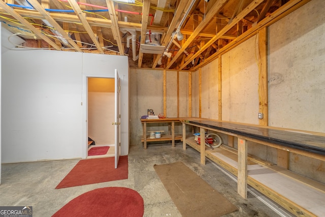 55 Cool Spring Ln, Clayton, GA 30525 - unfinished below grade area with a workshop area